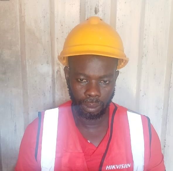 GESINGO CEO wearing a hard hat and work vest